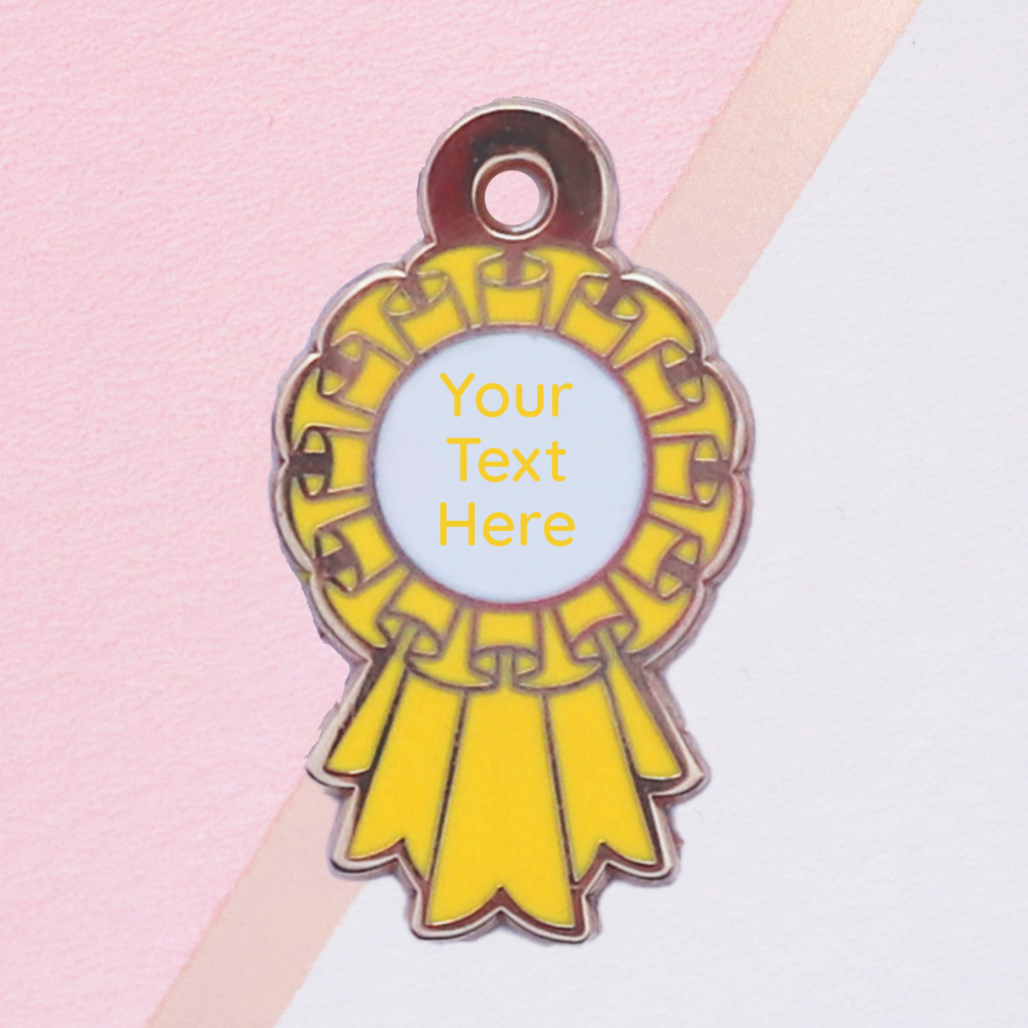 Yellow ribbon award badge with customizable text on a pink and white background